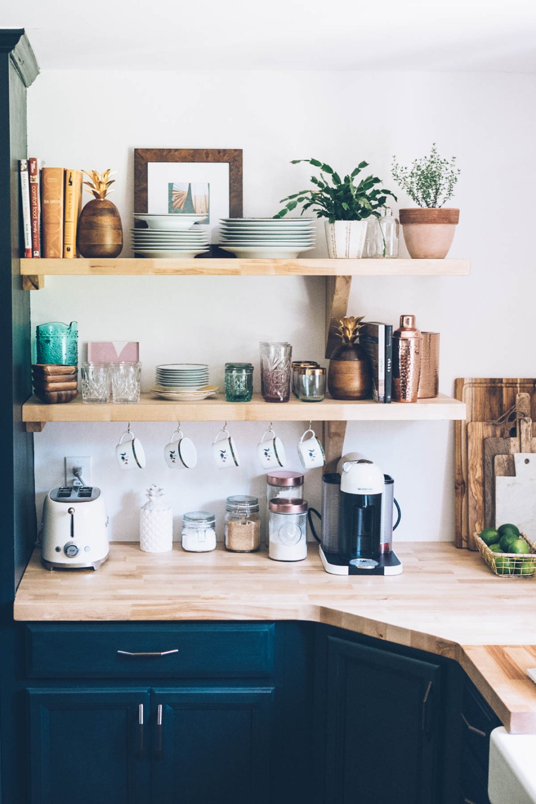 Jess Ann Kirby kitchen renovation with new open shelving and butcher block countertops