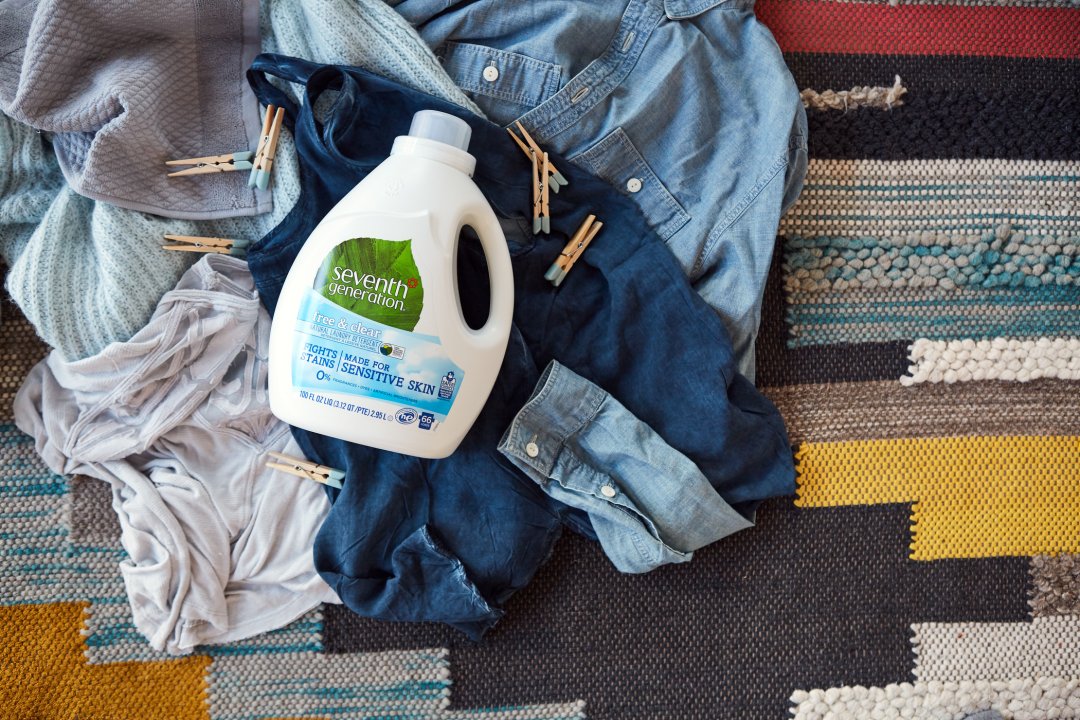 laundry bottle on pile of clothes