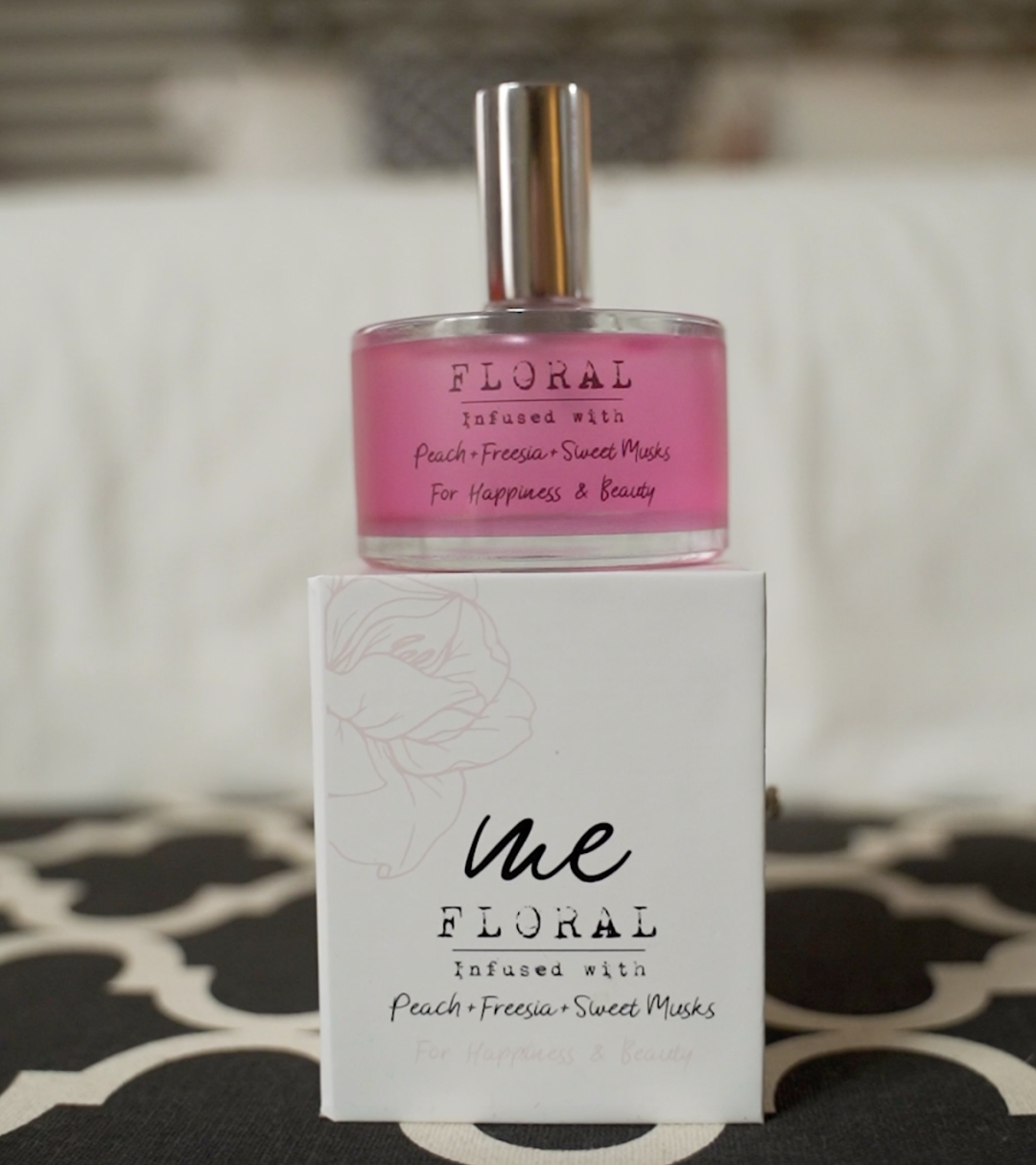 A bottle of Floral perfume.