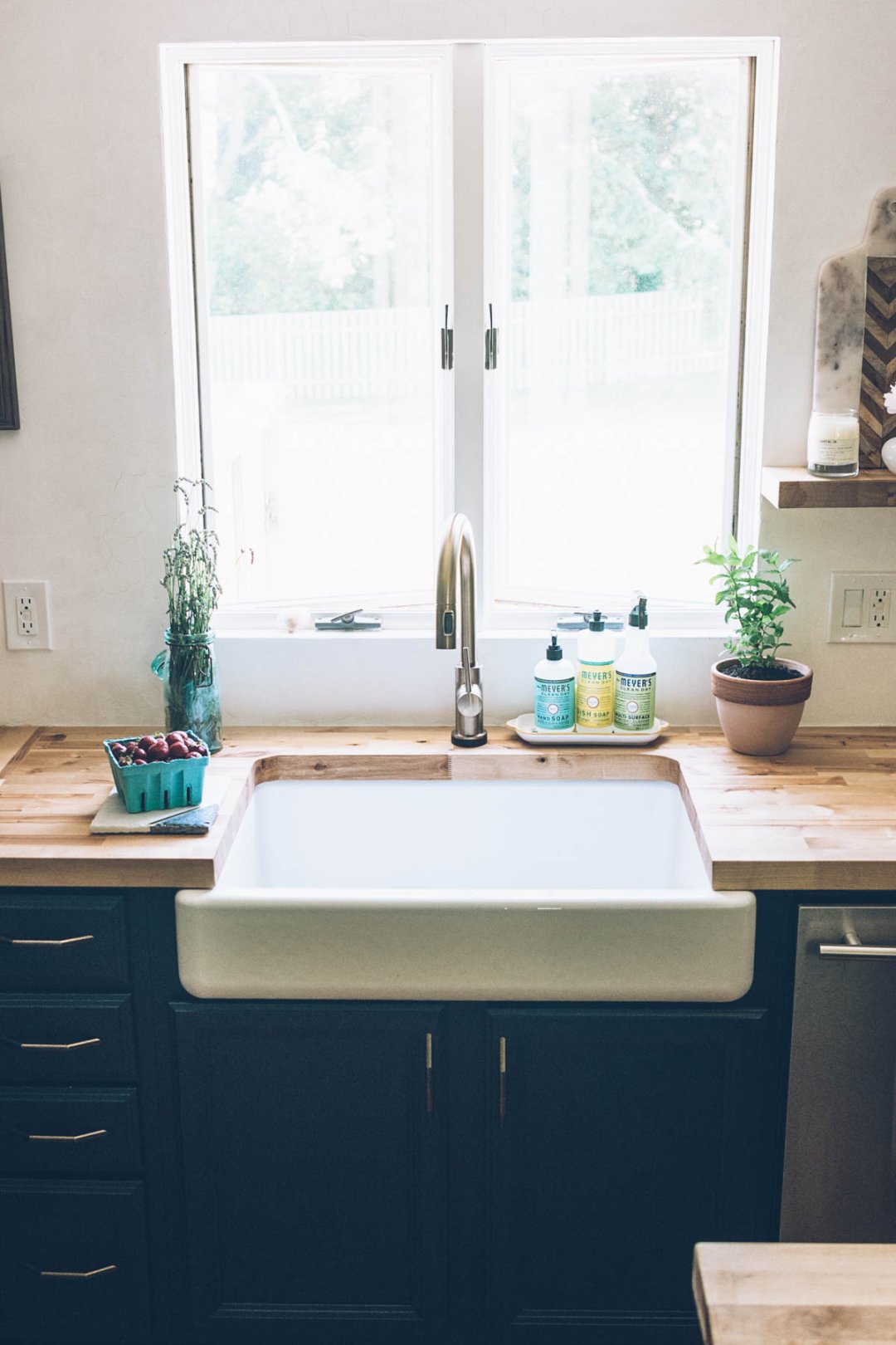Jess Ann Kirby's kitchen renovation with new farmhouse sink and Delta champagne bronze faucet